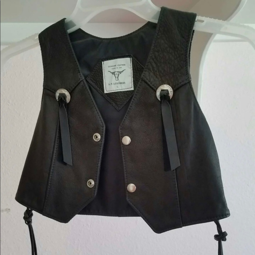Child’s leather vest like new